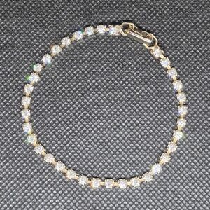 VINTAGE Clear Rhinestones in Gold Tone Setting Tennis Bracelet